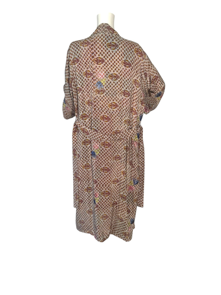 Outside back view of vintage silk reversible kimono in tan paisley with pink and blue embroidered flowers