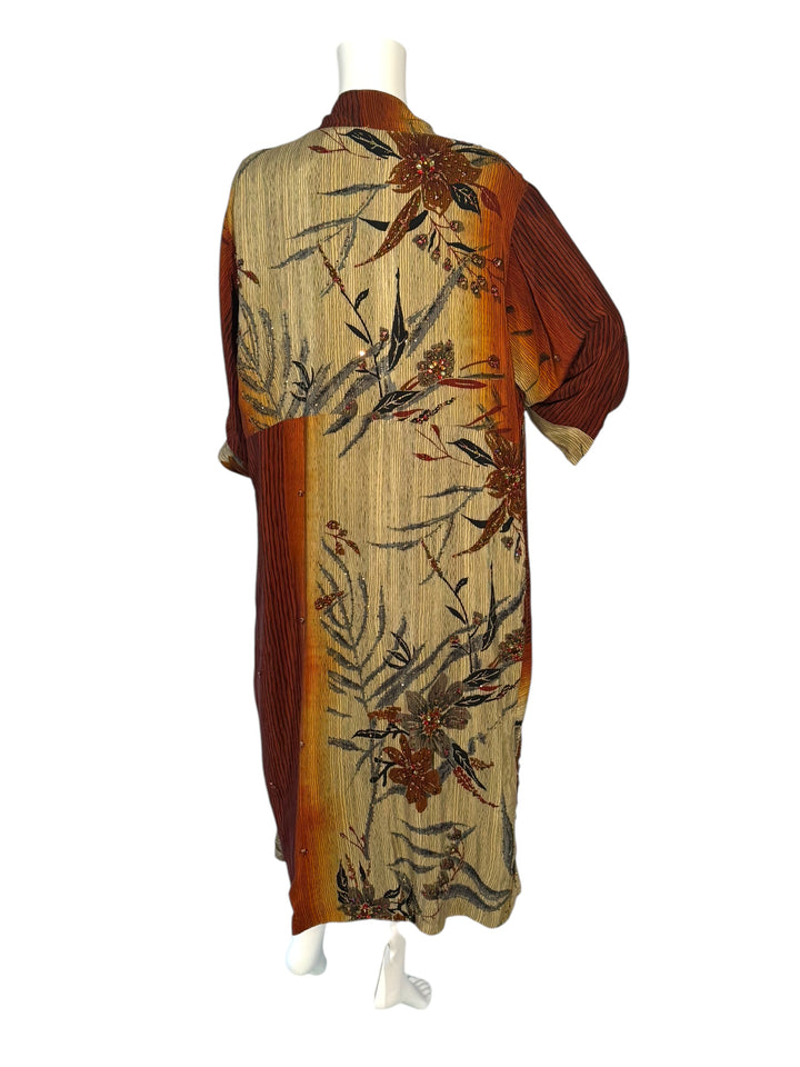 Outside back view of reversible kimono in beige rust and black bamboo print with embroidery