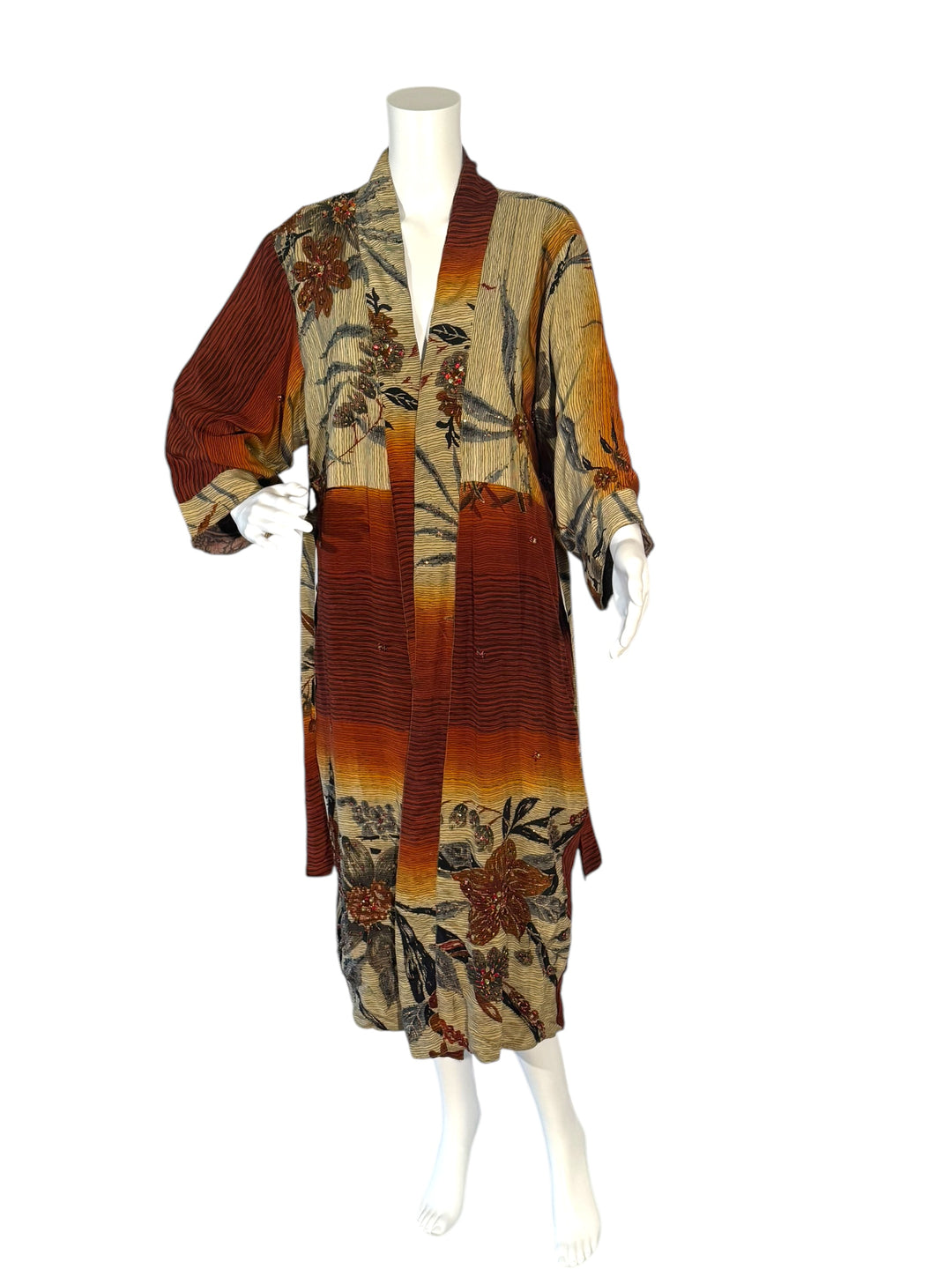 Outside front view of reversible kimono in beige rust and black bamboo print with embroidery without tie belt