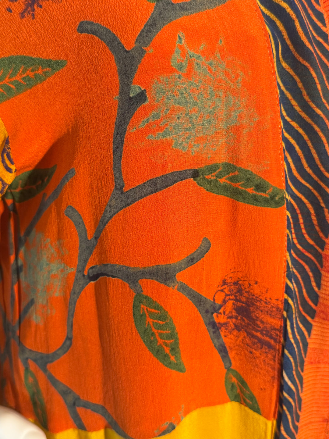 Orange vintage silk with green vines