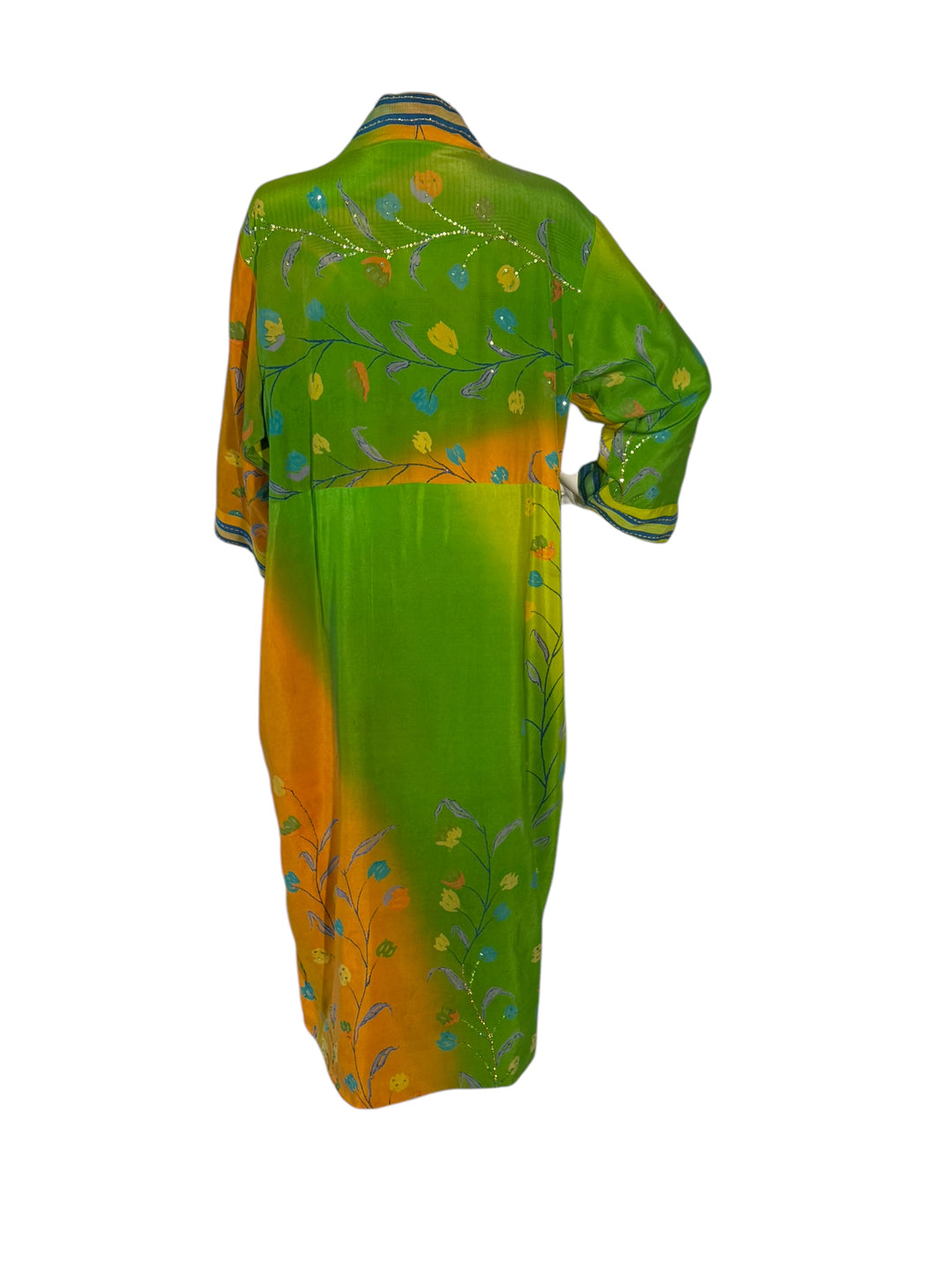 Back outside view of reversible kimono in green and orange floral with metallic embroidery