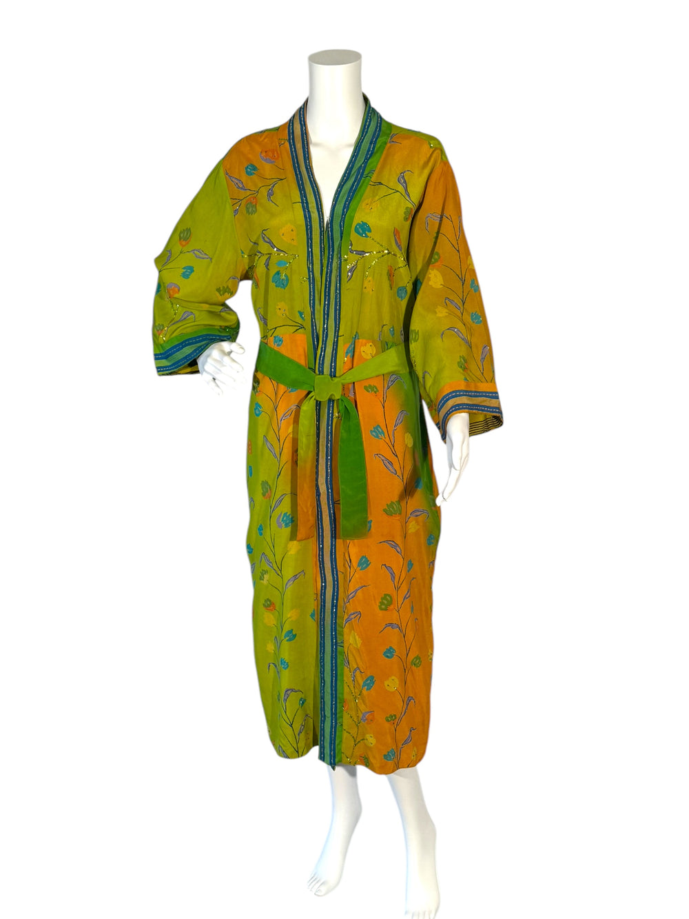 Front outside view of reversible kimono in green and orange floral with metallic embroidery