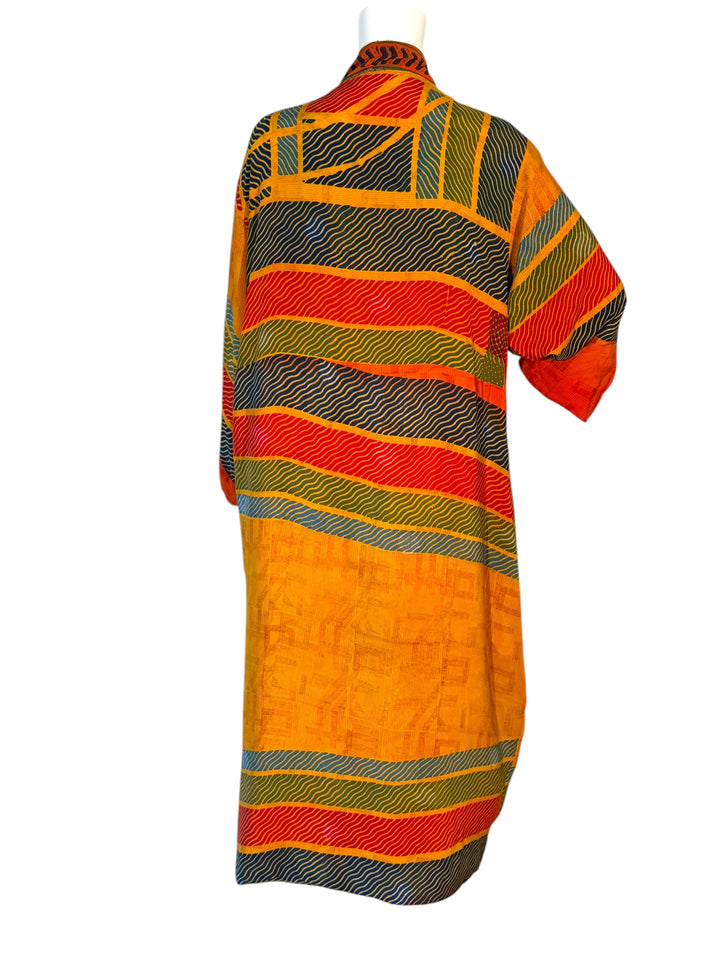 Back inside of reversible kimono showing red, green, blue and yellow patterns