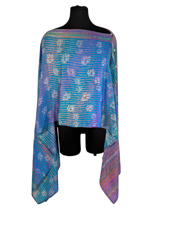 Sideways view of vintage silk Willow Wrap in blue with multicolor stripes & sequins