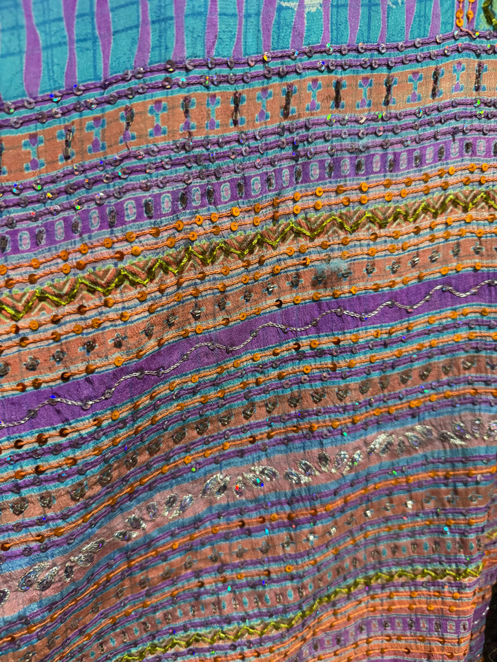 Close view of vintage silk Willow Wrap in blue with multicolor stripes & sequins