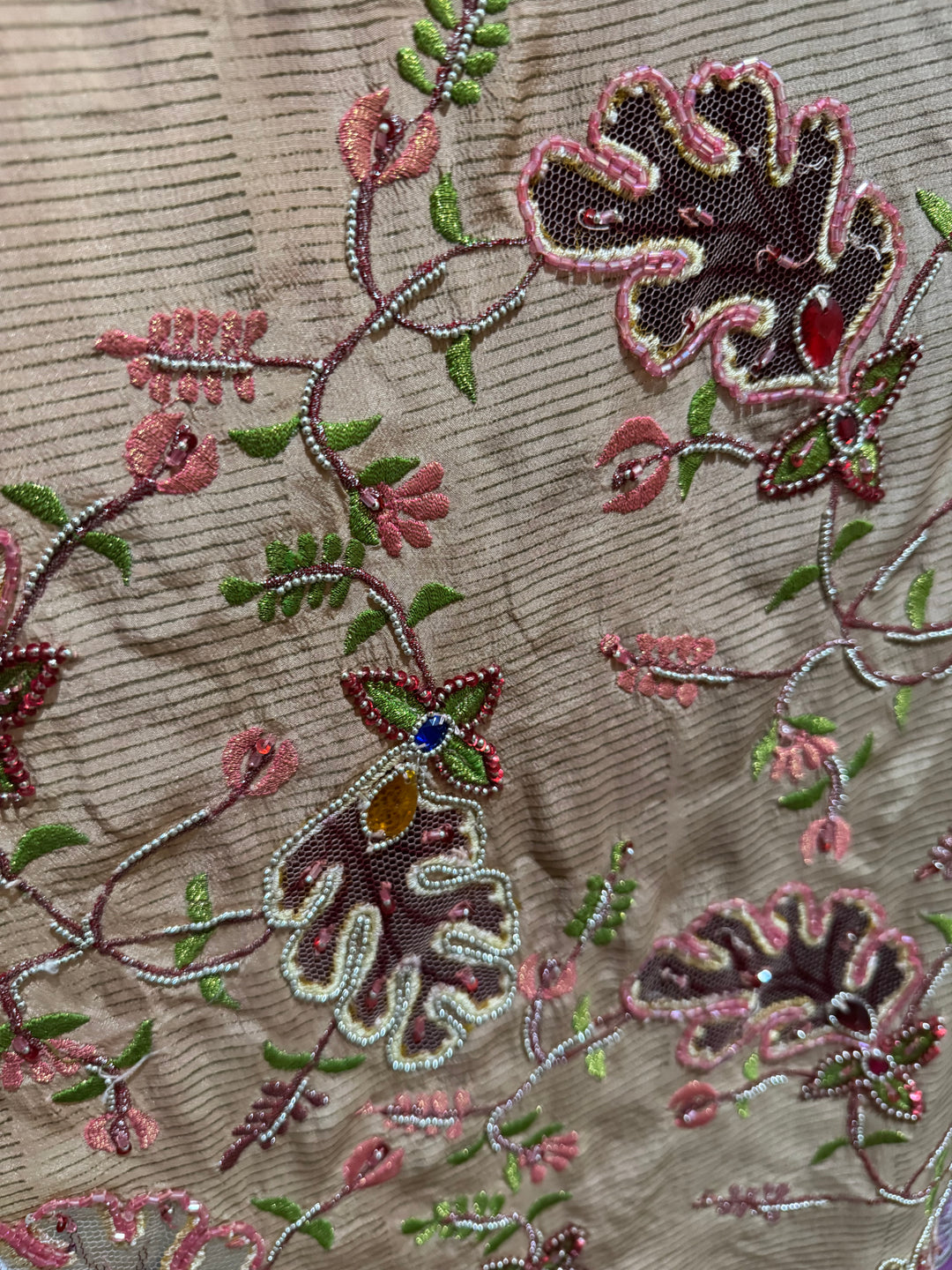Close view of vintage silk Willow Wrap in red and tan with cut out and extravagant embroidery