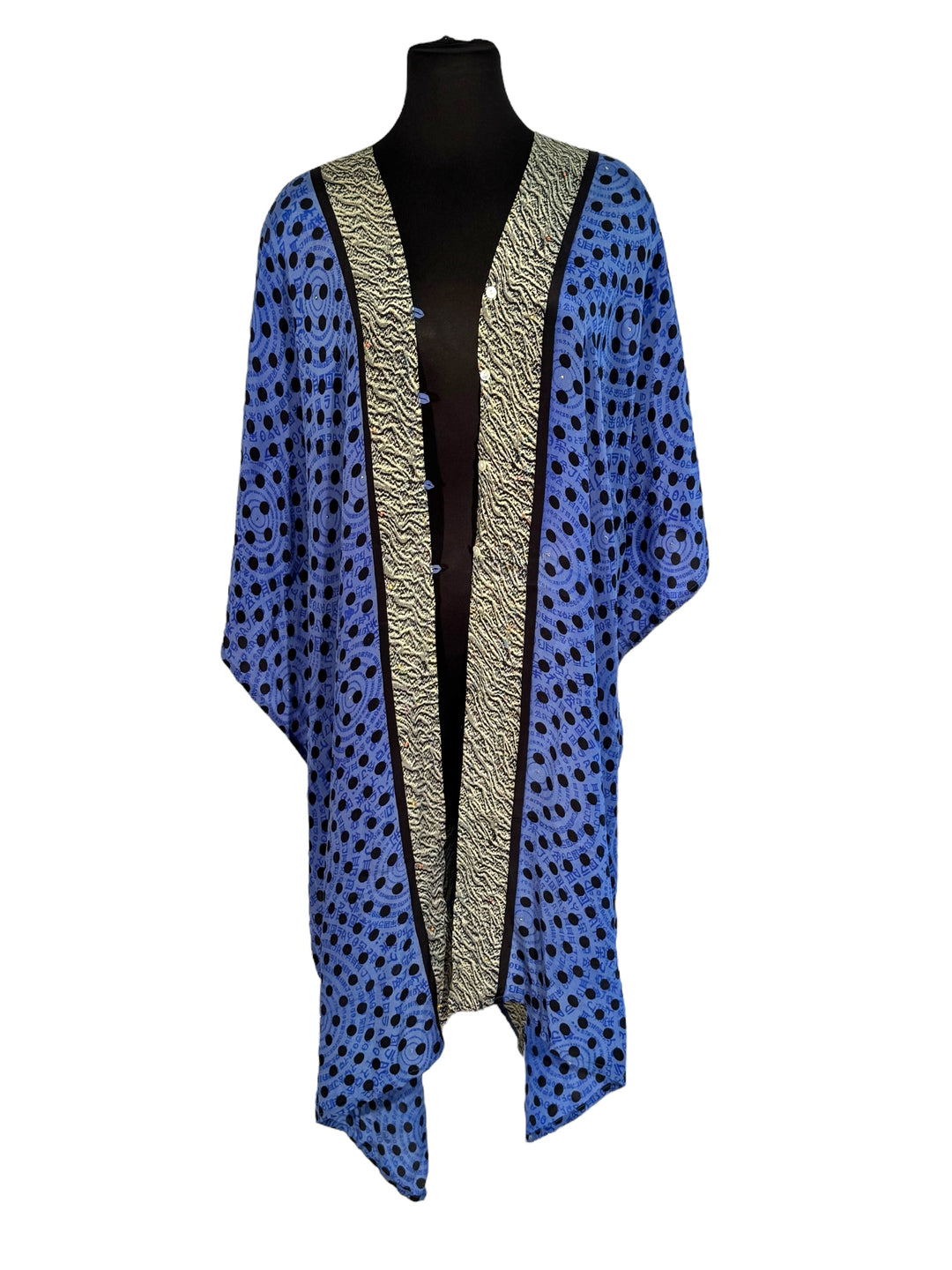 Front view of vintage silk Willow Wrap in Blue, Black and Cream graphic patter with small sequins