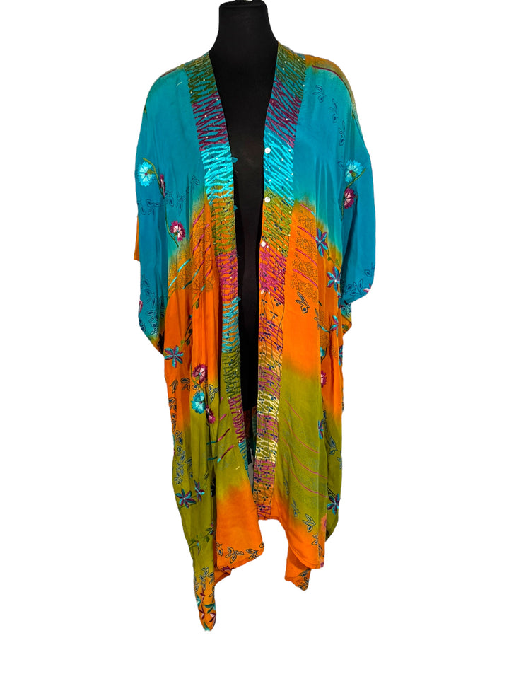 Front view of vintage silk Willow Wrap in Orange and Blue, Black  with extensive floral embroidery 