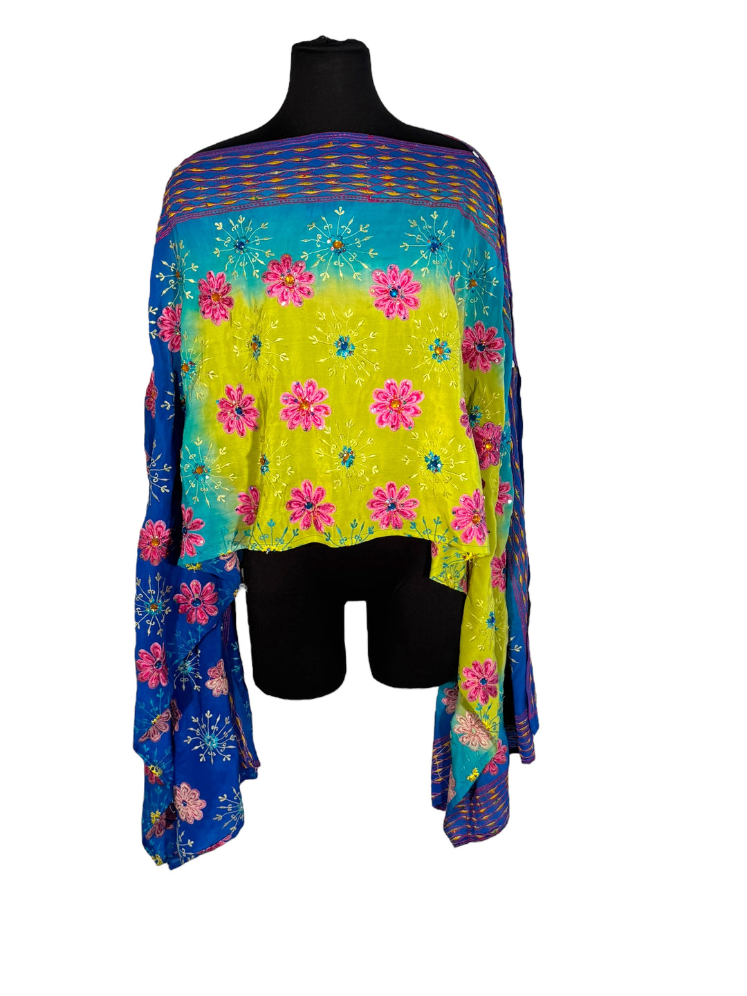 Sideways view of vintage silk Willow Wrap in Blue and yellow  with extensive floral embroidery