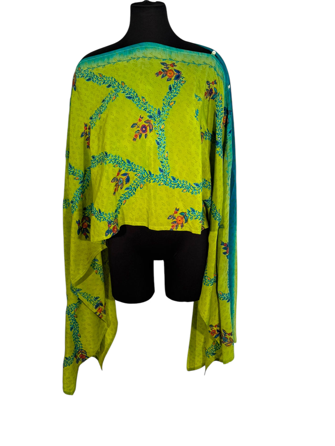 Sideways view of vintage silk Willow Wrap in green and blue  with extensive floral embroidery