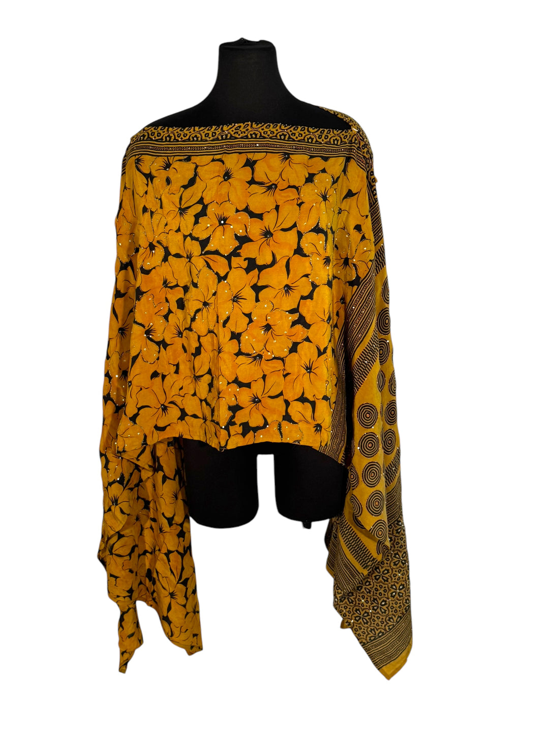 Sideways view of vintage silk Willow Wrap in gold and black  graphic and floral print with sequins