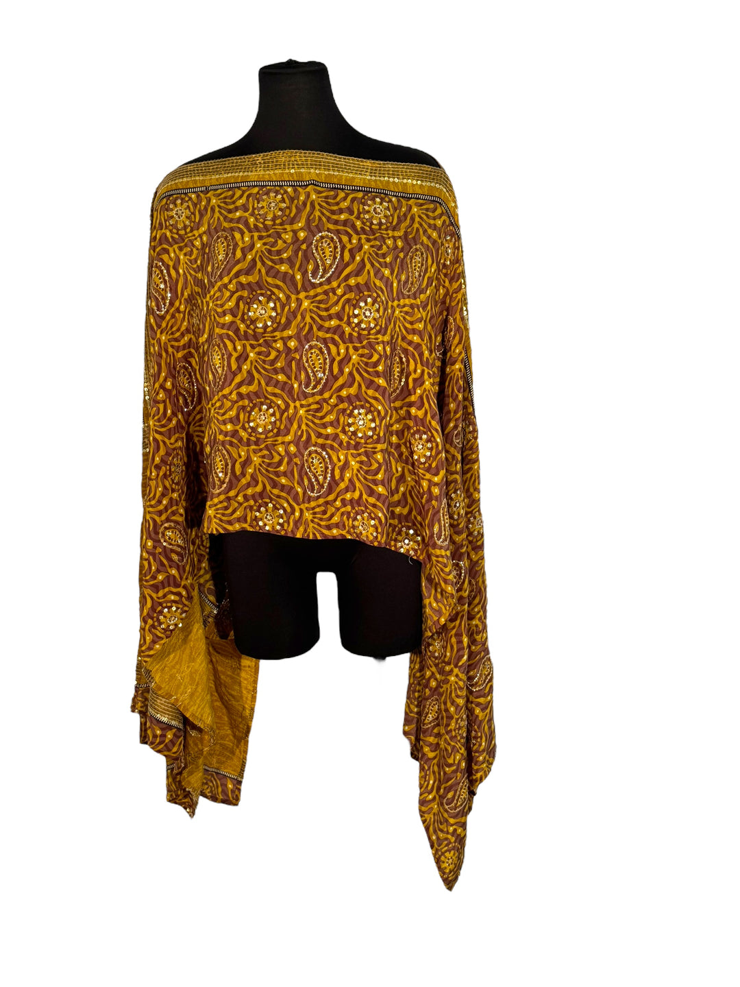 Sideways view of vintage silk Willow Wrap in gold vine and paisley print with emboidery and sequins