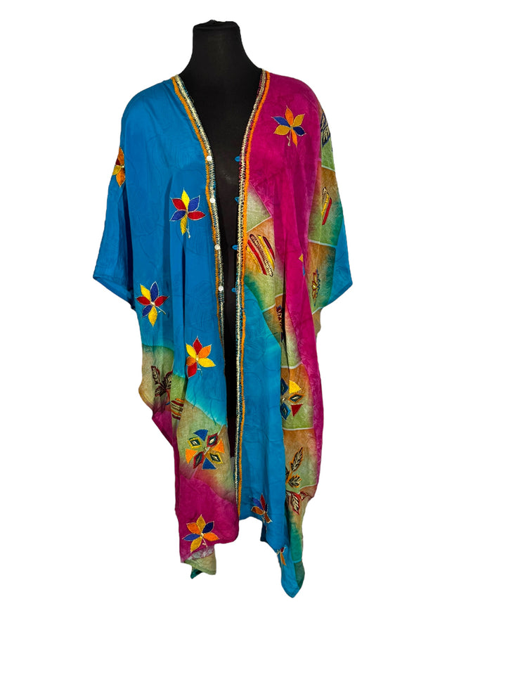 Front view of vintage silk Willow Wrap in blue and pink with  colorful floral emboidery 