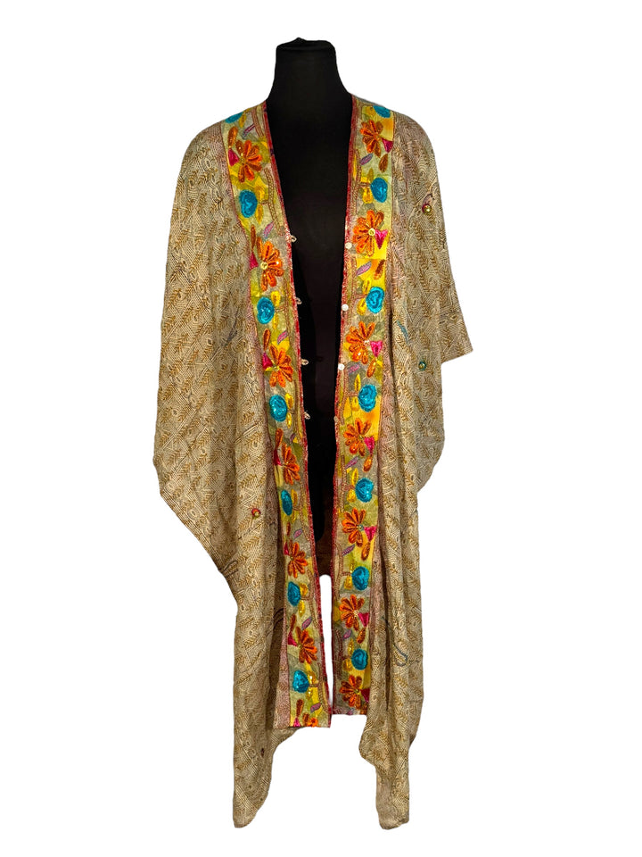 Front view of vintage silk Willow Wrap in tan print and intricate floral emboidered border