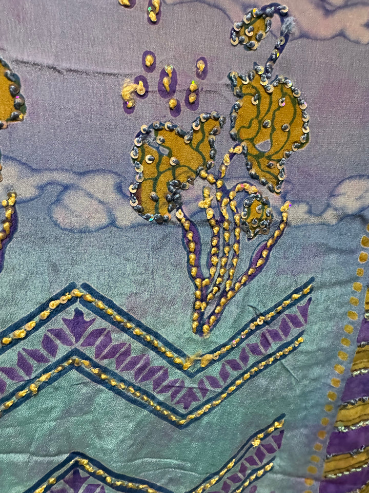 Detail view of vintage silk Willow Wrap in blue and lavender with gold sttipes and clouds and sequins