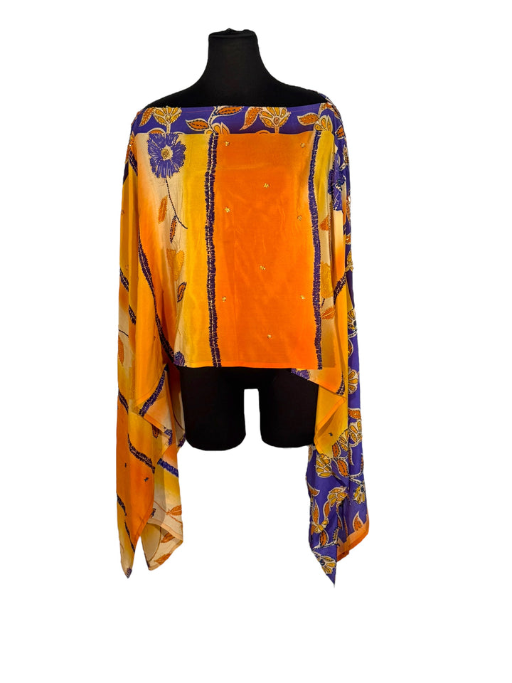 Sideways view of vintage silk Willow Wrap in orange and blue big floral print with sequins