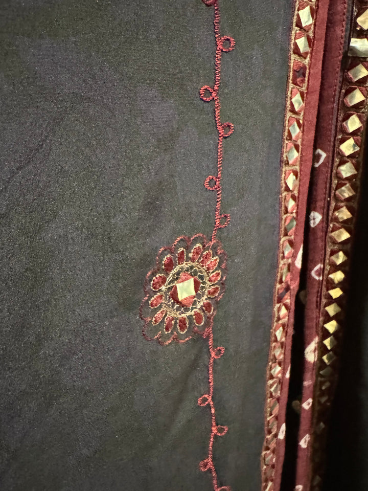 Detail view of vintage silk Willow Wrap in navy blue  with red embroidery and trim and mirroring