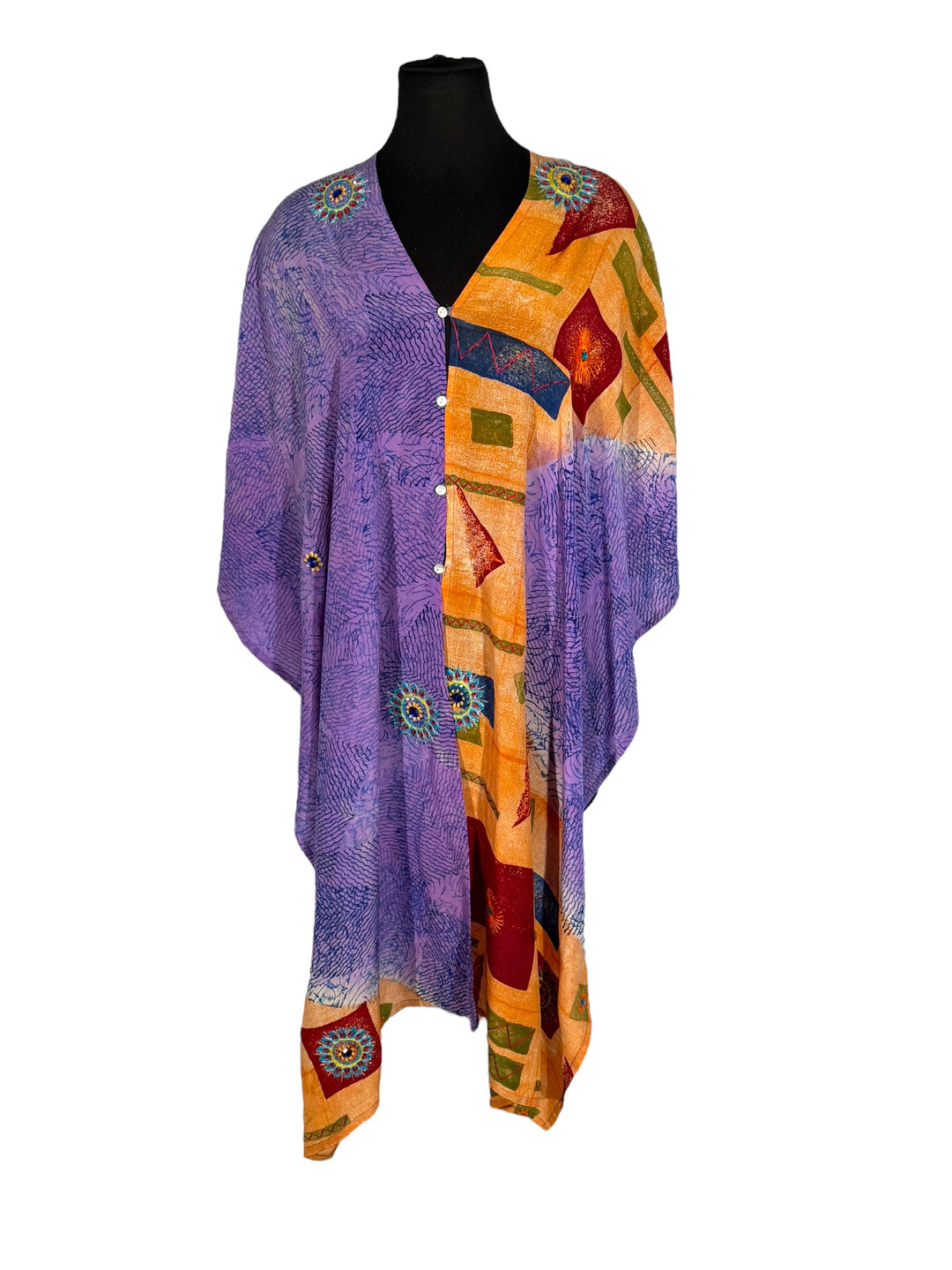 Front view of vintage silk Willow Wrap in orange  and purple with geometric print and large floral embroidery with rhinestones