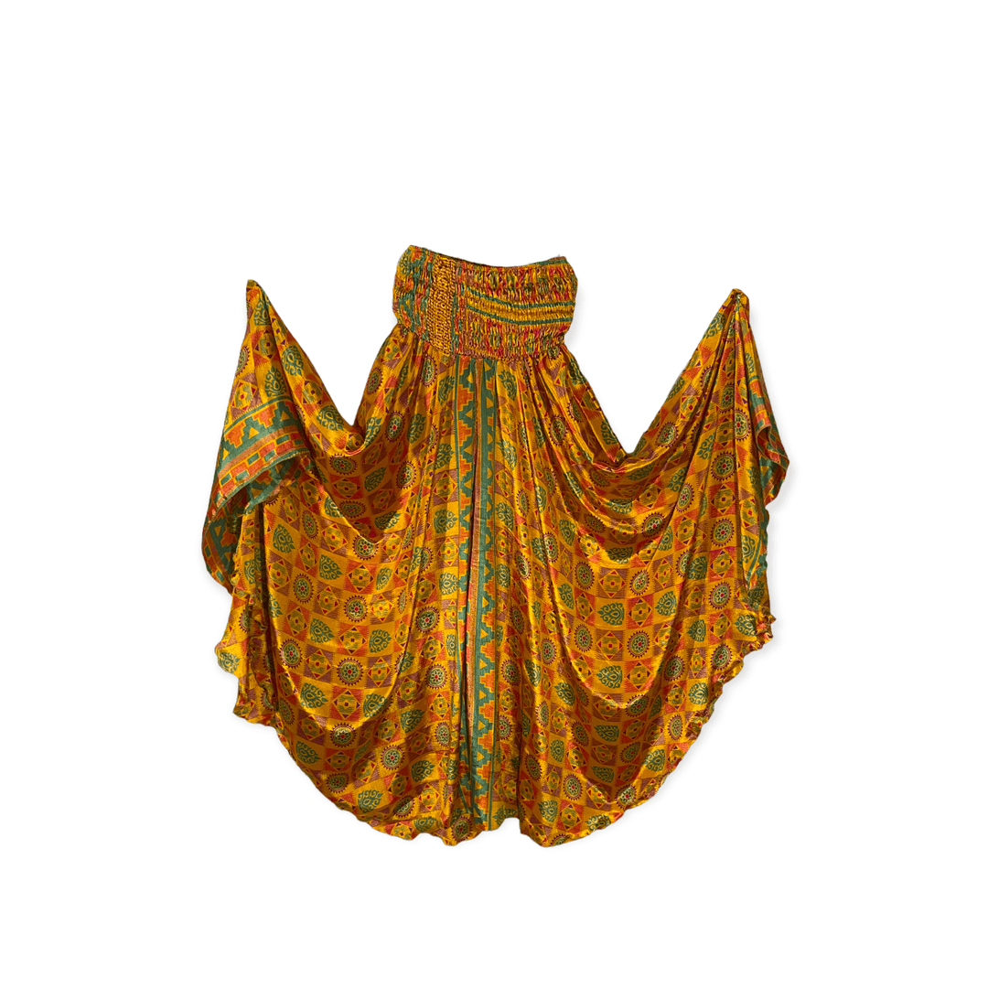 Bright yellow sustainable silk blend palazzo with red and green print.  39: length from waist