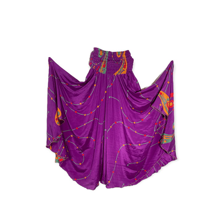 Purple abstract print with green, red and gold on sustainable silk blend palazzos. 39" length from waist